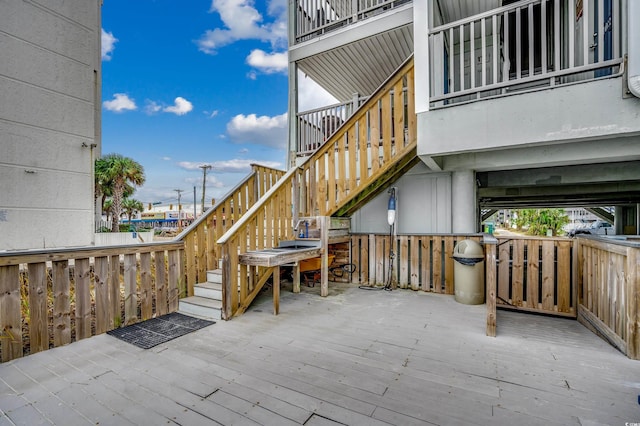 view of patio with a deck and stairway