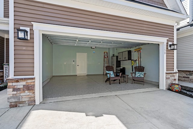 garage featuring driveway