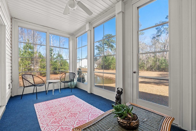 sunroom / solarium with ceiling fan