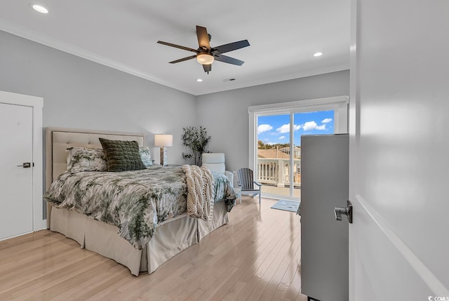 bedroom featuring light wood finished floors, access to outside, crown molding, and recessed lighting