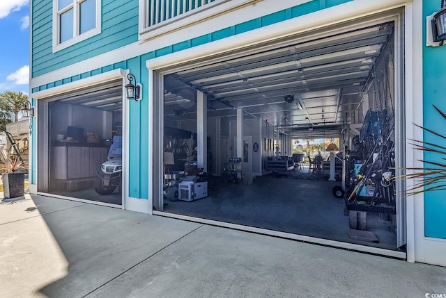 doorway to property featuring a garage