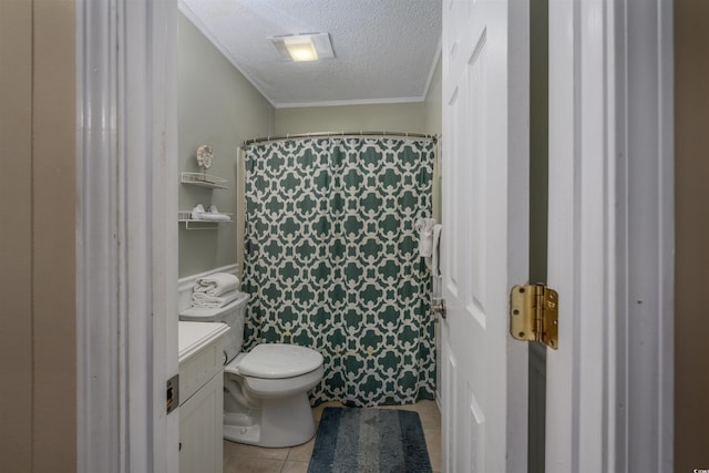 bathroom featuring a shower with shower curtain, toilet, tile patterned flooring, a textured ceiling, and vanity