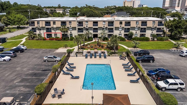 view of swimming pool with fence