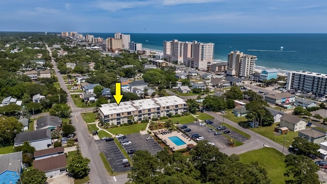 drone / aerial view with a view of city and a water view