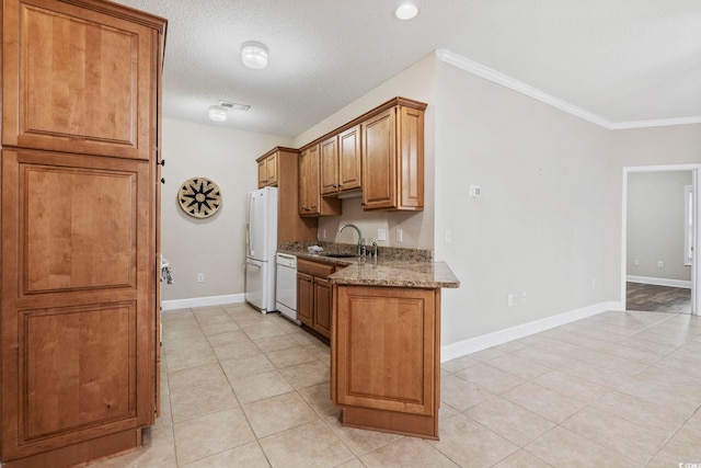 160 Lazy Willow Ln Unit 204, Myrtle Beach, SC 29577 - kitchen with white appliances, a sink, light stone counters, brown cabinets, and light tile patterned floors