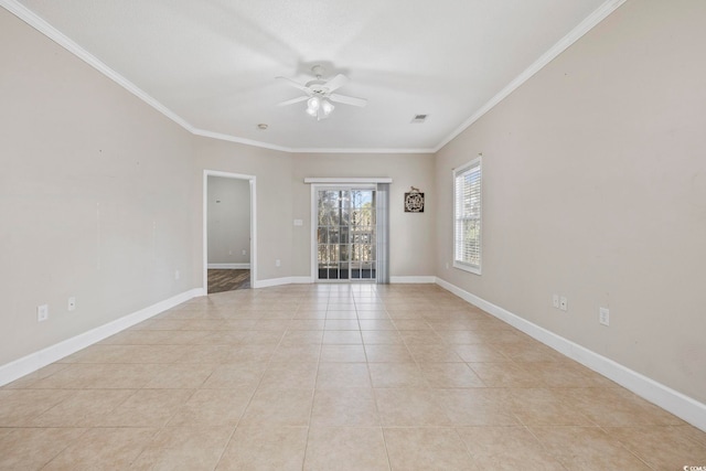 unfurnished room with crown molding, light tile patterned floors, visible vents, a ceiling fan, and baseboards