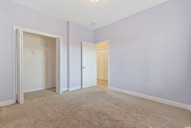 160 Lazy Willow Ln Unit 204, Myrtle Beach, SC 29577 - unfurnished bedroom with carpet flooring, a closet, and baseboards