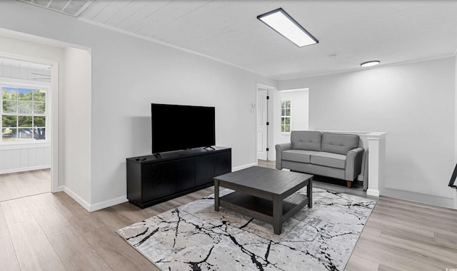 214 2nd Ave S, North Myrtle Beach, SC 29582 - living room with plenty of natural light and wood finished floors