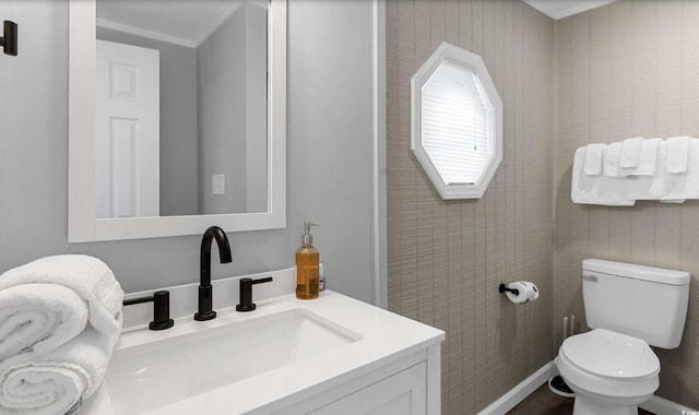 214 2nd Ave S, North Myrtle Beach, SC 29582 - bathroom featuring vanity and ornamental molding