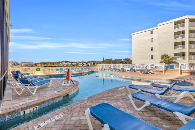 9400 Shore Dr Unit 722, Myrtle Beach, SC 29572 - community pool featuring a patio area