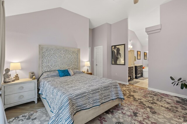 4856 Bermuda Way N, Myrtle Beach, SC 29577 - bedroom with baseboards, high vaulted ceiling, and connected bathroom