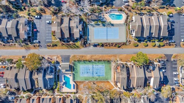 birds eye view of property with a residential view