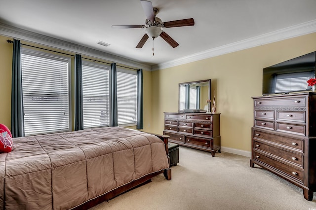 bedroom featuring light carpet, visible vents, baseboards, ceiling fan, and ornamental molding