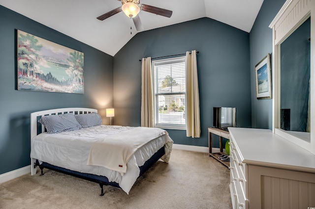 bedroom with light carpet, ceiling fan, baseboards, and lofted ceiling