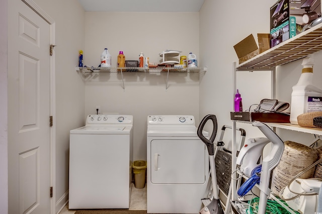 laundry room featuring laundry area and washing machine and dryer