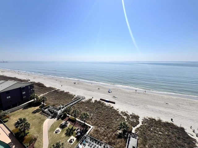 bird's eye view with a view of the beach and a water view