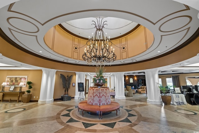 community lobby featuring a high ceiling and recessed lighting