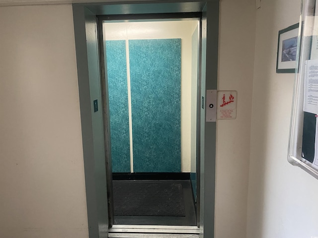 doorway to property with elevator