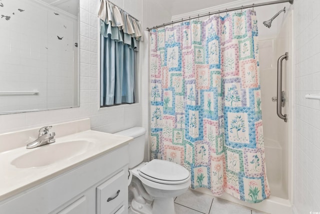 full bathroom with tile walls, toilet, a shower with shower curtain, vanity, and tile patterned floors