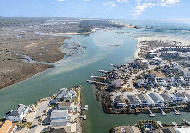 bird's eye view with a residential view and a water view