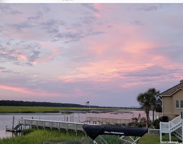 water view featuring a floating dock