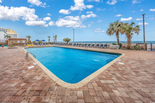 community pool featuring a patio area