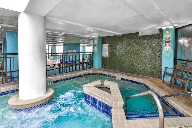 view of swimming pool featuring an indoor in ground hot tub