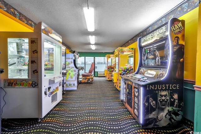 rec room with carpet floors and a textured ceiling