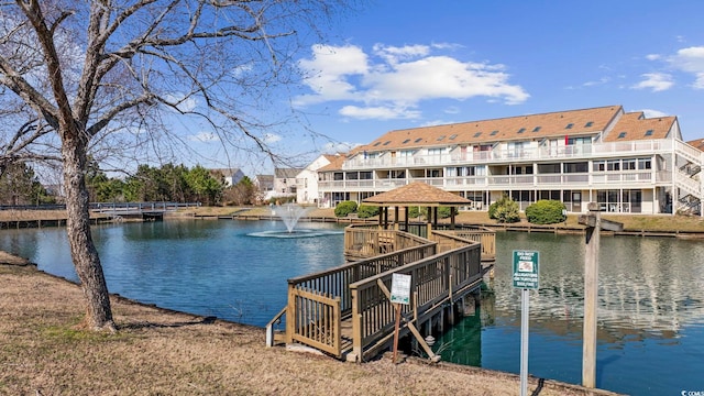 view of dock with a water view
