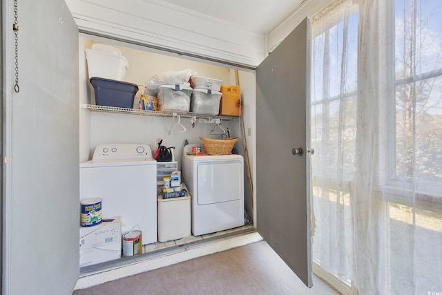 laundry room featuring laundry area and washer and clothes dryer