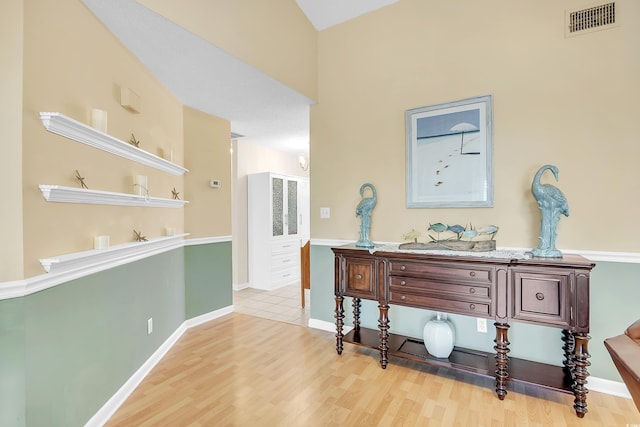 6634 Cinnamon Fern Ln, Myrtle Beach, SC 29588 - hall with light wood finished floors, baseboards, and visible vents