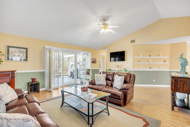 6634 Cinnamon Fern Ln, Myrtle Beach, SC 29588 - living room featuring lofted ceiling, a ceiling fan, baseboards, visible vents, and light wood-style floors