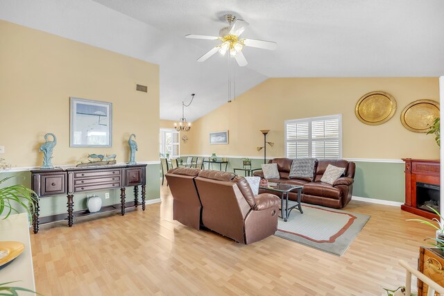 6634 Cinnamon Fern Ln, Myrtle Beach, SC 29588 - living area with lofted ceiling, light wood finished floors, plenty of natural light, and visible vents