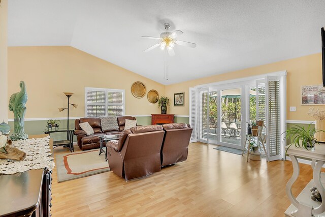 6634 Cinnamon Fern Ln, Myrtle Beach, SC 29588 - living area with light wood-style floors, lofted ceiling, and a ceiling fan