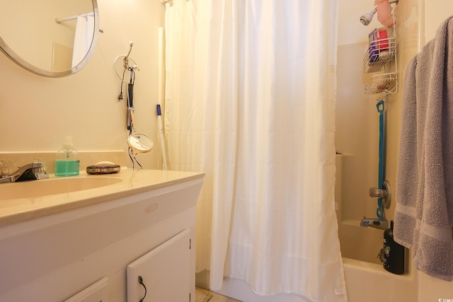 bathroom featuring shower / bathtub combination with curtain and vanity