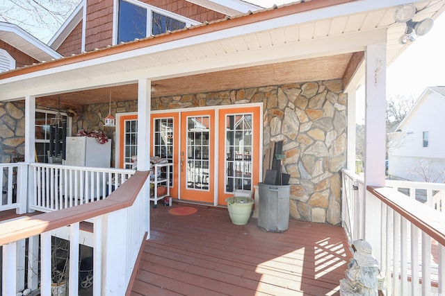 wooden deck featuring covered porch