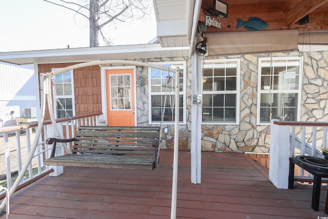 wooden terrace featuring central AC