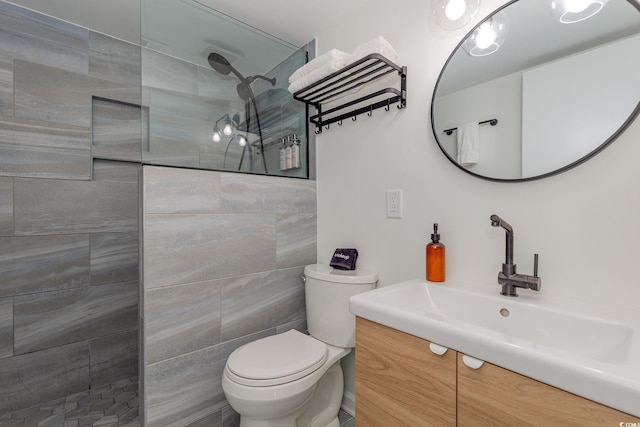 bathroom with vanity, toilet, and walk in shower