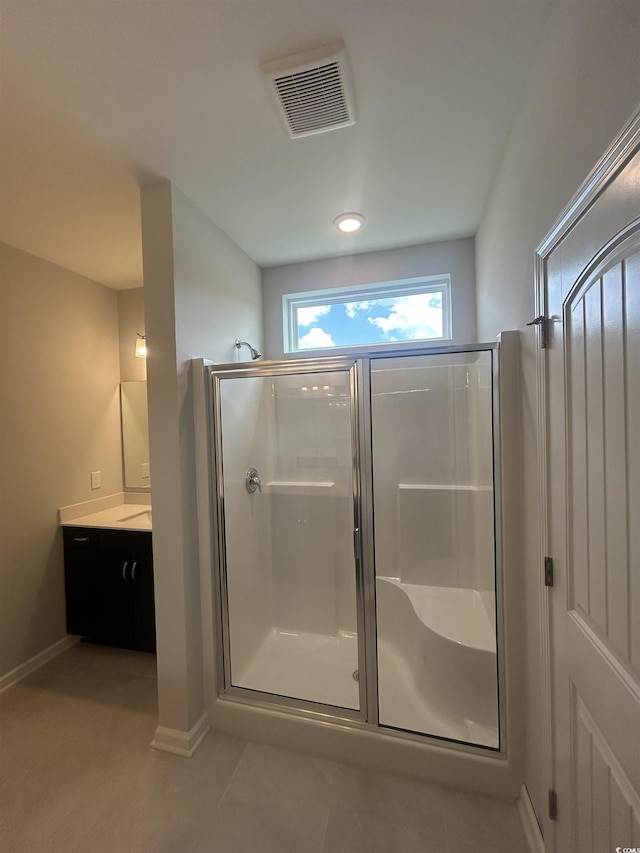 360 Kapalua Loop, Little River, SC 29566 - bathroom featuring a shower stall, vanity, and baseboards