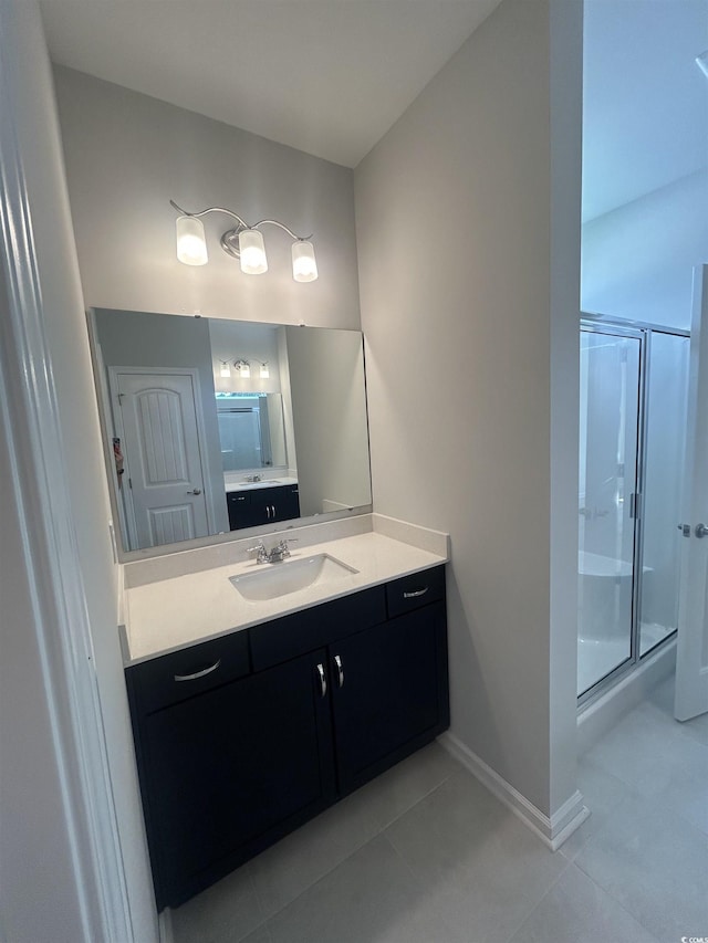 360 Kapalua Loop, Little River, SC 29566 - full bathroom with tile patterned flooring, a shower stall, vanity, and baseboards