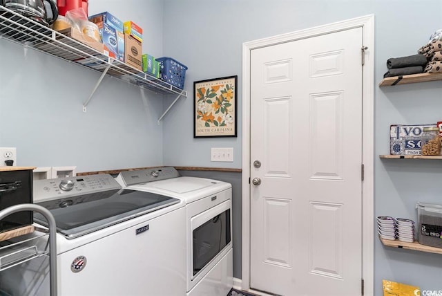 clothes washing area with laundry area and separate washer and dryer