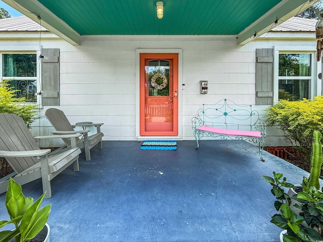 632 Magnolia Dr, Georgetown, SC 29440 - property entrance with a porch