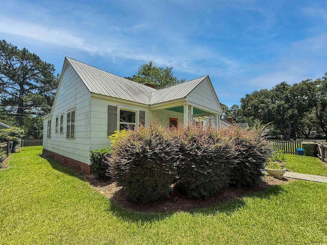 632 Magnolia Dr, Georgetown, SC 29440 - view of side of home featuring a metal roof and crawl space