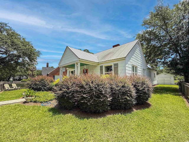632 Magnolia Dr, Georgetown, SC 29440 - view of side of property with a metal roof