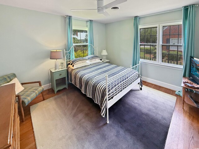 632 Magnolia Dr, Georgetown, SC 29440 - bedroom featuring ceiling fan and wood finished floors