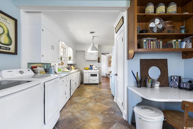 kitchen with white cabinetry, light countertops, independent washer and dryer, and pendant lighting