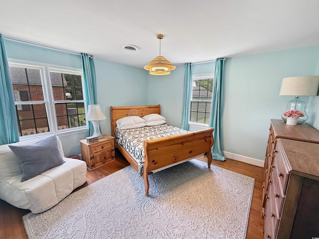 632 Magnolia Dr, Georgetown, SC 29440 - bedroom featuring wood finished floors and baseboards