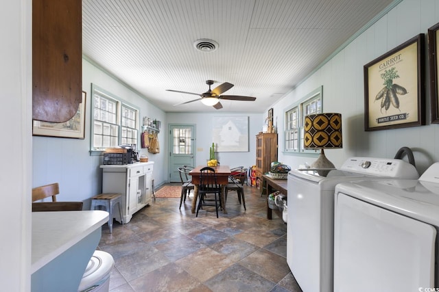 washroom with visible vents, washing machine and dryer, laundry area, and a ceiling fan