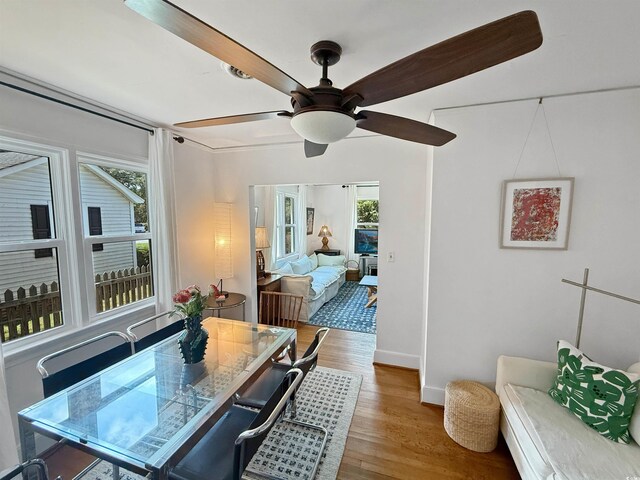 632 Magnolia Dr, Georgetown, SC 29440 - dining room featuring wood finished floors and a ceiling fan