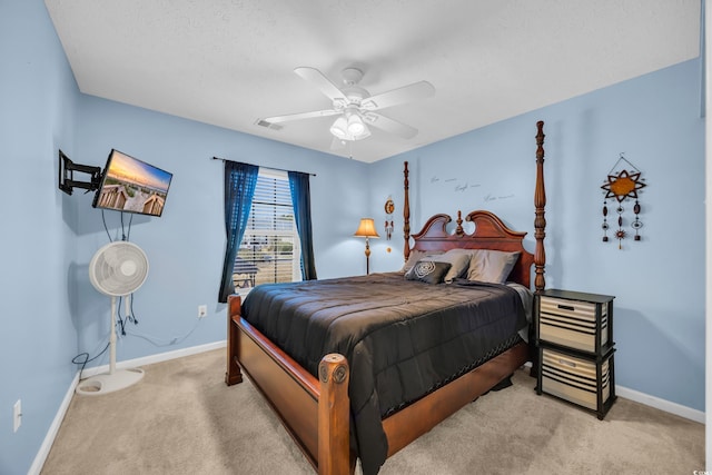 bedroom featuring visible vents, ceiling fan, baseboards, and carpet floors